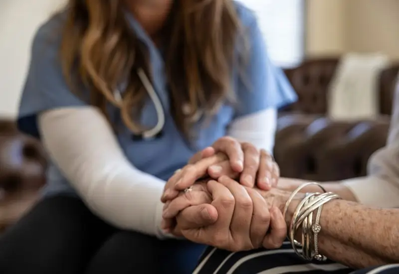 Elderly woman receiving healthcare