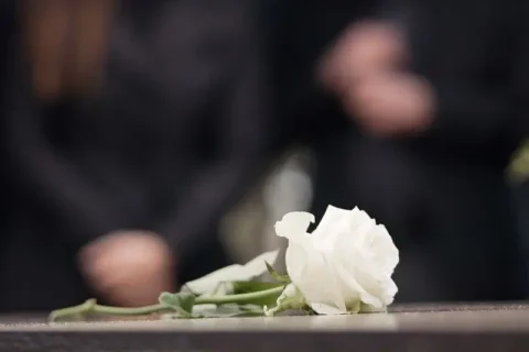 Funeral, rose and flower on coffin