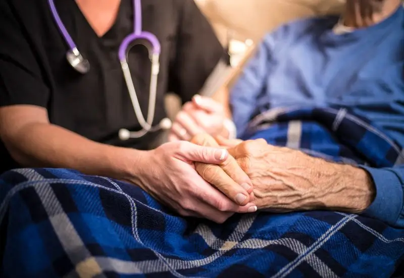 Hospice Nurse visiting an Elderly male patient